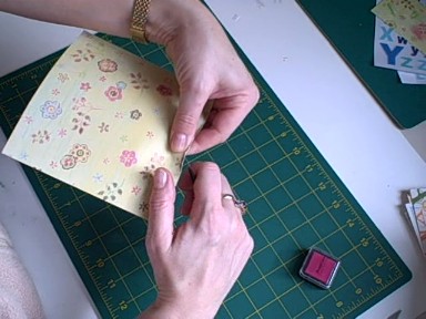 Using scissors to distress the edges